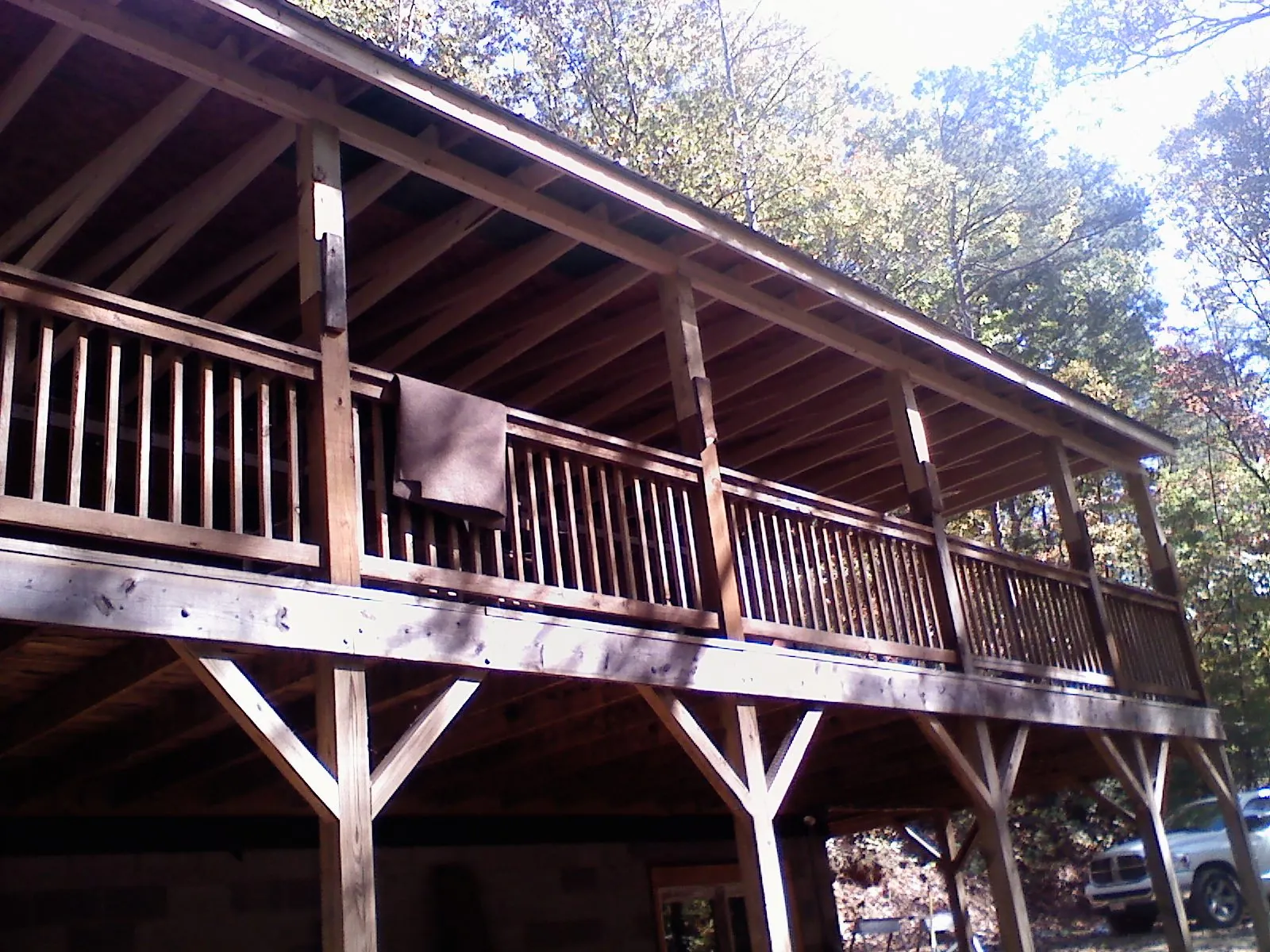 Timber framing under a new elevated porch and deck — Roof Leak Repair in Norwood Young America by Roofing Brothers